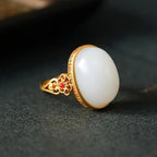 Hetian White Jade Oval Ring Gilding S925 Silver Pattern Hollow Out