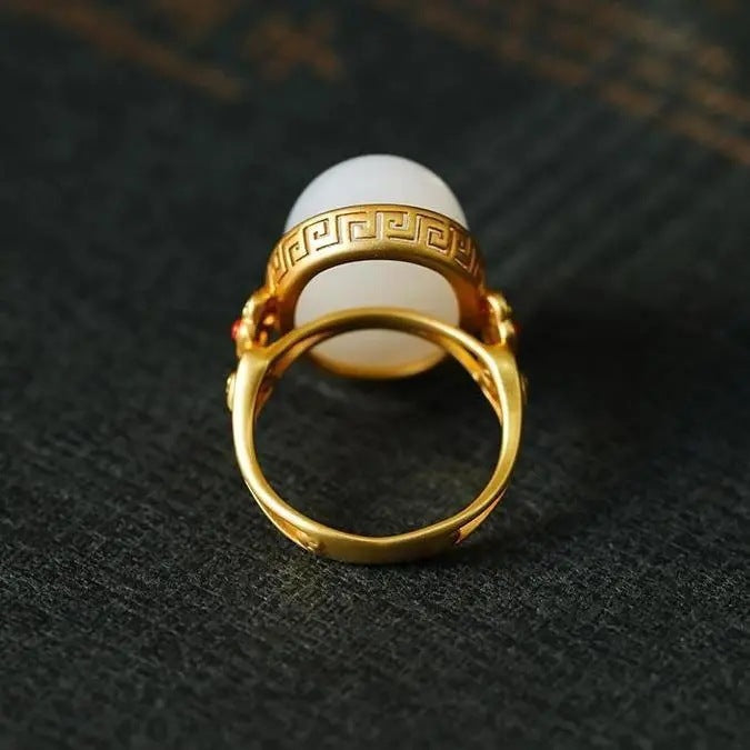 Hetian White Jade Oval Ring Gilding S925 Silver Pattern Hollow Out